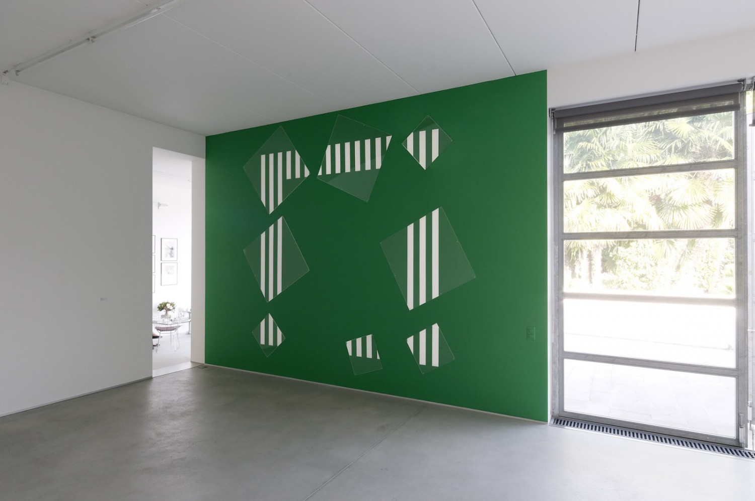 Daniel Buren, ‘Cadre Fragmenté A’, 1991, 8 elements in plexiglas, white stripes, on green wall