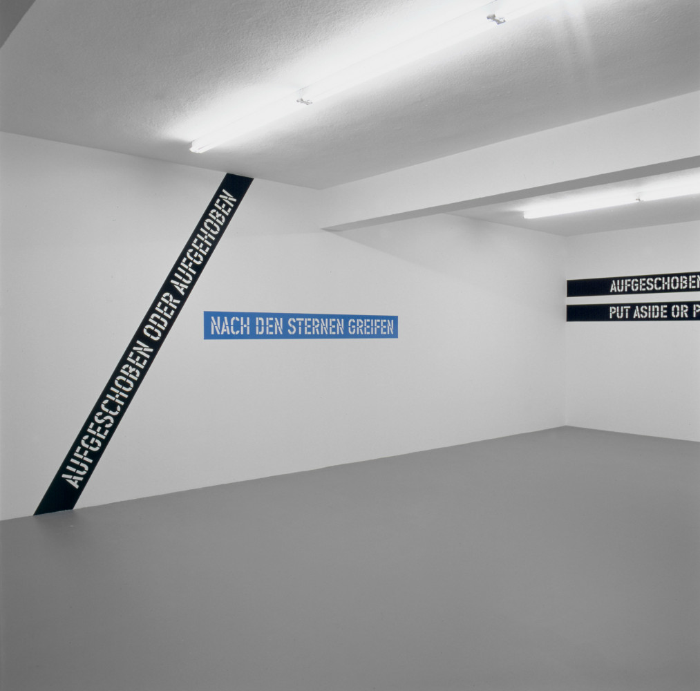 Lawrence Weiner, ‘AUFGESCHOBEN ODER AUFGEHOBEN NACH DEN STERNEN GREIFEN PUT ASIDE OR PUT AWAY REACHING FOR THE STARS’, Installation view, Buchmann Galerie Köln, 2002