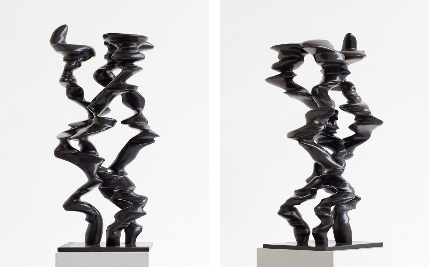 A sculpture with three columns by the british artist Tony Cragg