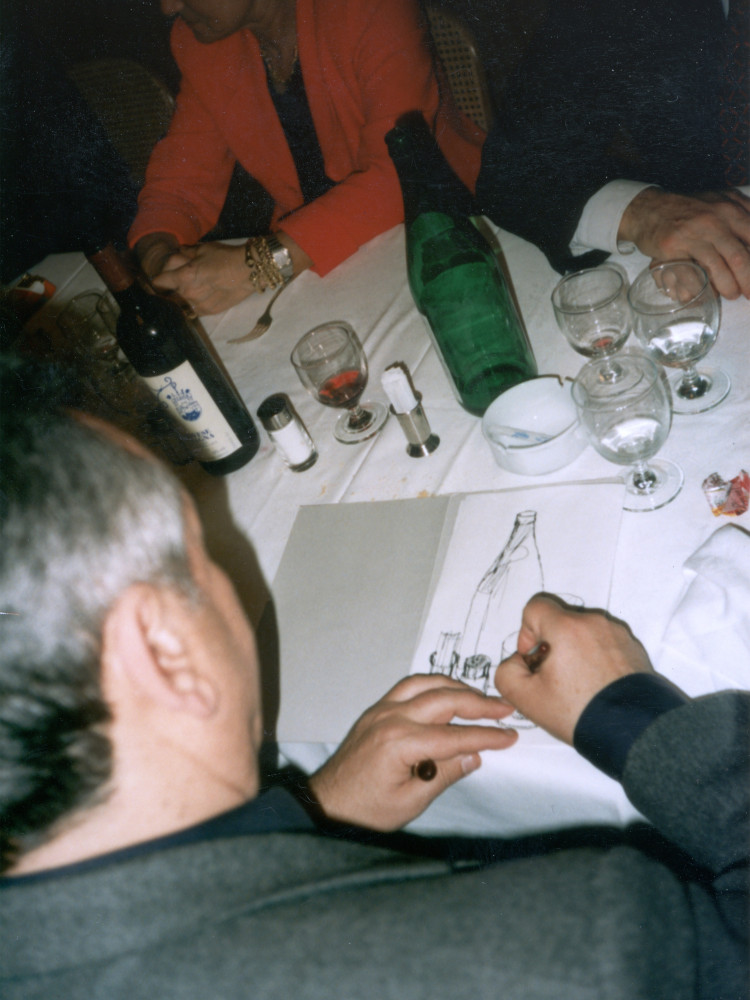 ‘Salvo drawing during the aftershow dinner at Buchmann Galerie Cologne, 1997’